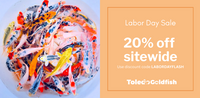 Colorful goldfish in clear tanks with a Labor Day sale banner on the right.